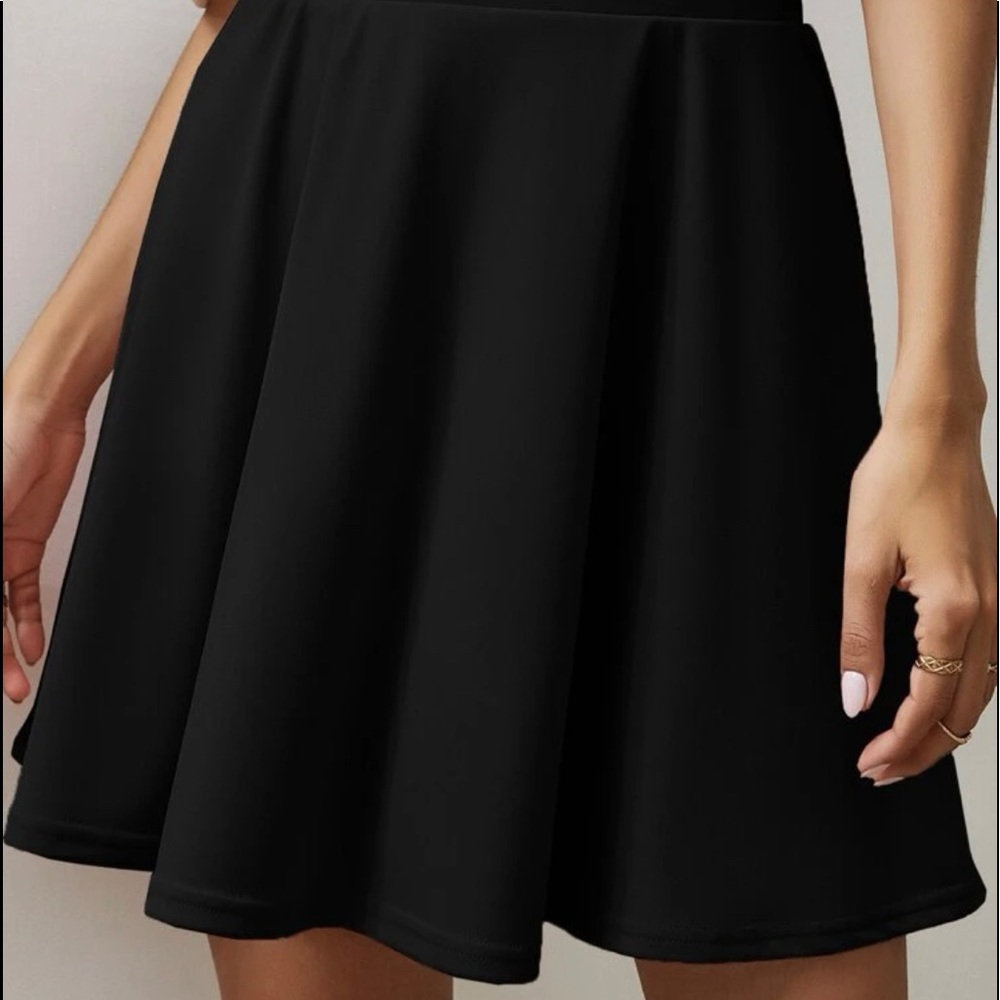 black mid thigh length skirt size S-M